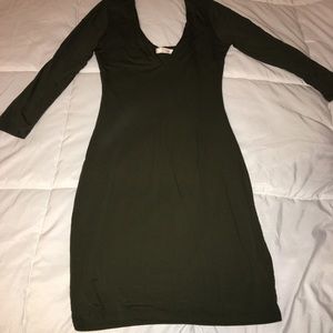 Long sleeve bodycone dress.